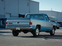 1975-1987 GM Truck 2.5 Inch Crossmember Back With X-Pipe Exhaust System Includes Catalytic Converters 409 Stainless Turbo Pro Mufflers Pypes Performance Exhaust
